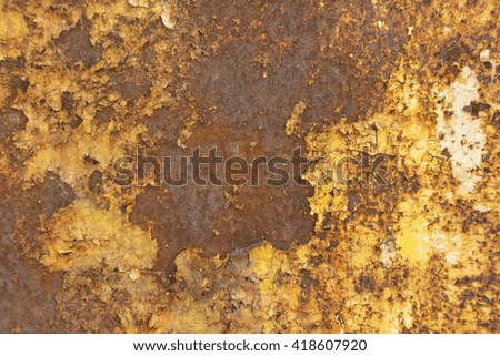 Cracked and rusted paint on metal plate