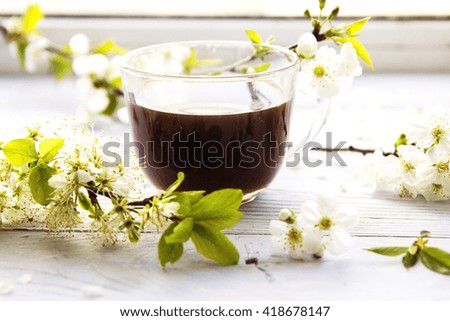 cup of coffee with spring flowers
