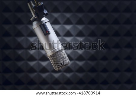 For radio stations and podcasts: background with professional microphone