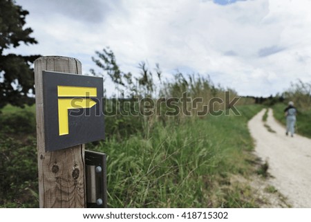 sign and hiker
