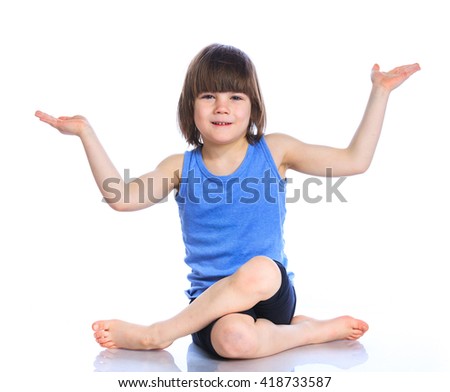 Cute little boy practice yoga. Isolated on the white background