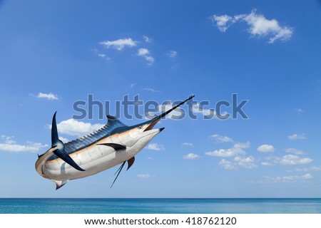 Marlin - Swordfish,Sailfish saltwater fish (Istiophorus) isolated on sea and sky  background Royalty-Free Stock Photo #418762120