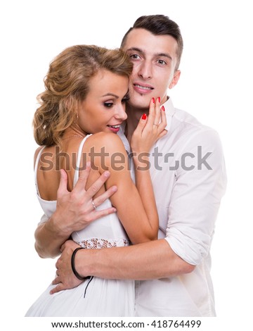 Cheerful young couple on white background, isolated