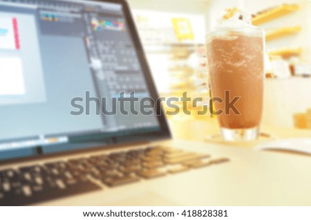 Blurred abstract background of Computer and  smoothie