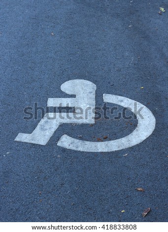 Handicap sign on the road public park