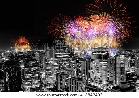 Fireworks celebrating over cityscape at night of Thailand. 