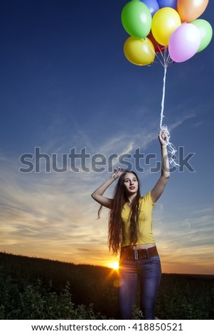 beauty girl with balloon outdoors