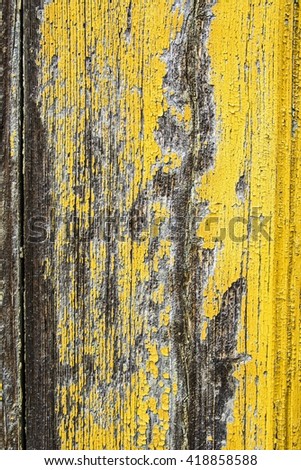 Old wooden surface with peeling paint.