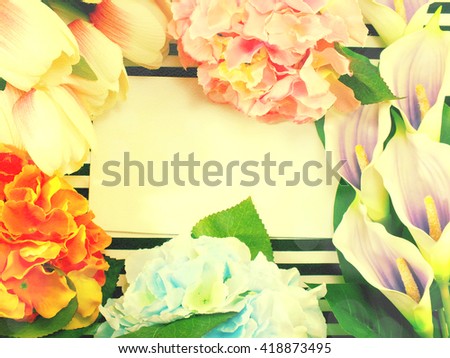 stylish branding mock up with flowers to display your artworks with vintage filter colors background