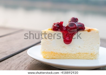 Slice of New York Cheesecake Royalty-Free Stock Photo #418892920