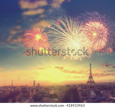 Abstract travel background: fireworks over Eiffel tower in Paris, France. Vintage colored picture