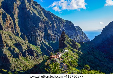 Mountain aerials view of Masca village at high altitude in the mountain in Tenerife island, Spain Royalty-Free Stock Photo #418980577