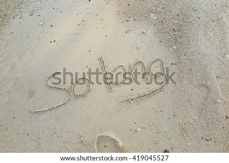 written words "So long" on sand of beach Royalty-Free Stock Photo #419045527