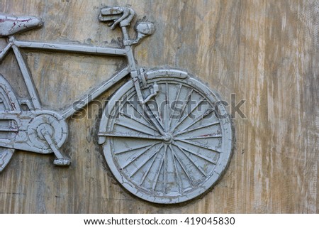 bicycle on the wall.