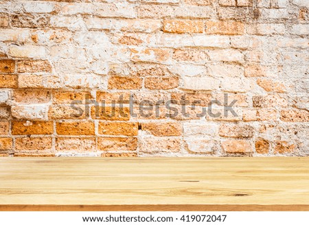 Wood table top brick wall background - can be used for display or montage your products