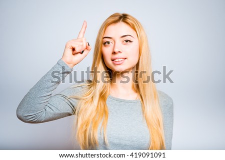 beautiful blonde girl has a great idea, closeup isolated on white background
