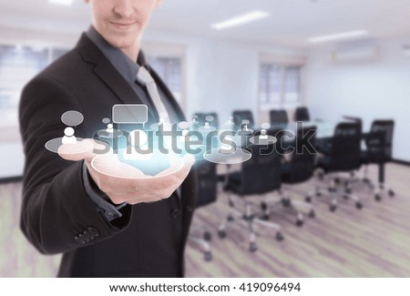 Businessman show meeting in a virtual space conceptual business symbol of social network  with meeting room background.
