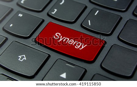 Business Concept: Close-up the Synergy button on the keyboard and have Red color button isolate black keyboard