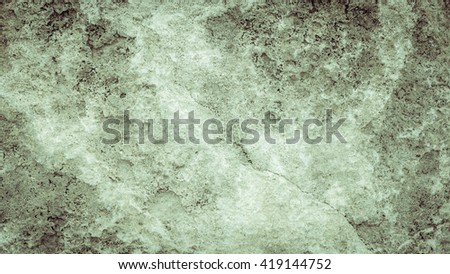 Stone texture background. A natural surface of a stone. Vintage filter.