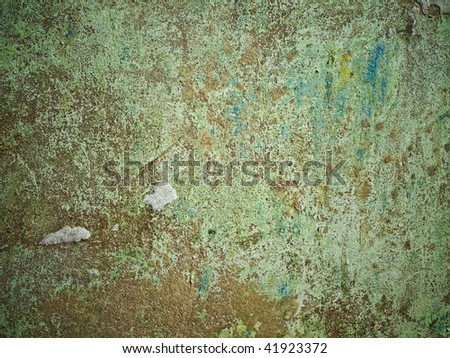 Photo of abstract grunge shabby background in green and light brown