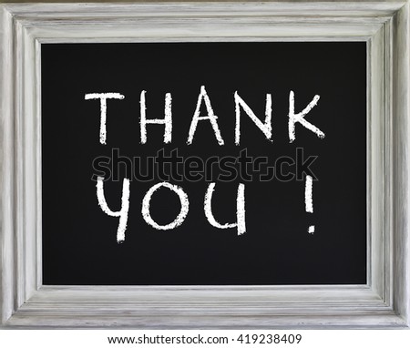 School chalkboard with written text: THANK YOU. End of school year and teacher day concept.