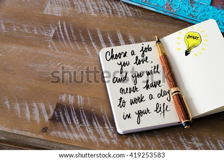 Handwritten text Choose a job you love, and you will never have to work a day in your life with fountain pen on notebook. Concept image with copy space available.