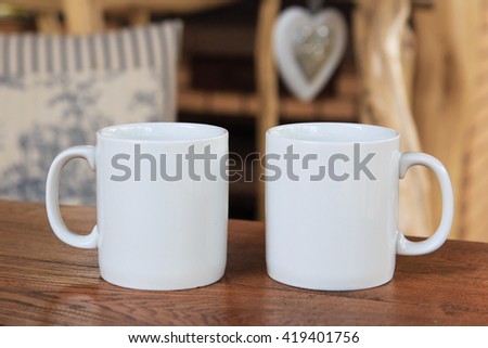 Two white mugs for mock-up Royalty-Free Stock Photo #419401756