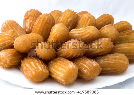 Oriental sweets on a white background Bama Royalty-Free Stock Photo #419589085