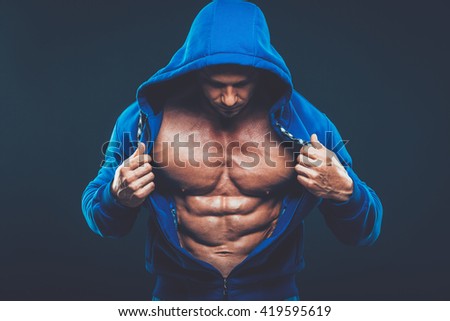 Man with muscular torso. Strong Athletic Men Fitness Model Torso