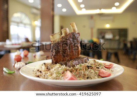 Lamb Biryani, Mutton Biryani, Wagyu Biryani served on ramadhan buffet  Royalty-Free Stock Photo #419625097