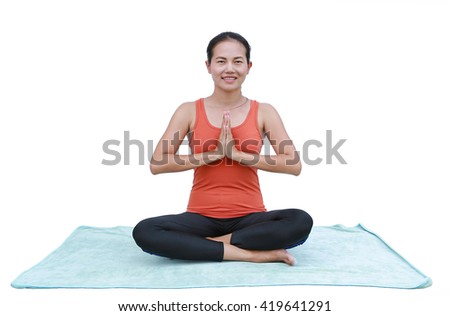Asian Young woman doing yoga exercises  isolated on white background