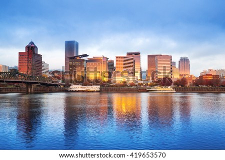tranquil water,cityscape and skyline of portland at sunrise
