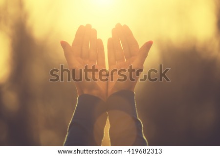Girl praying for the sunny weather. Royalty-Free Stock Photo #419682313