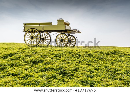 A uncovered wagon retro style in beautiful nature scene farmland.