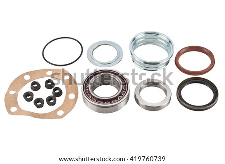 bearings and tool isolated on white background. Spare parts. Kit