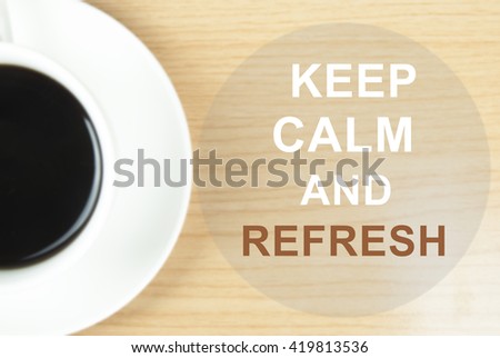 Keep Calm and Refresh on on wood table background