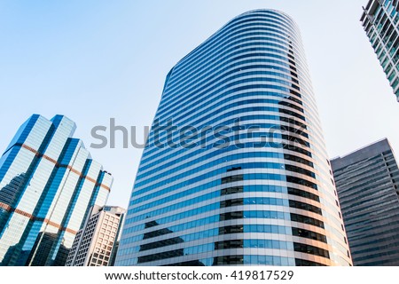 tall building, business tower at downtown, City center, bussness area between evening to twilight night, Bangkok, capital city of Thailand