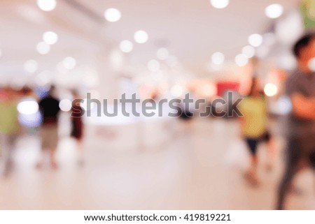 blur background image of people in Shopping mall.