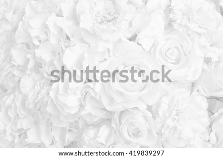 Beautiful decoration artificial rose flower in white tone background.