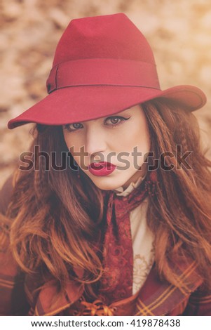 Closeup portraits of a beautiful Jewish girl in a pink hat in a retro style with a professional makeup and bright lipstick, emotions, smile, vintage