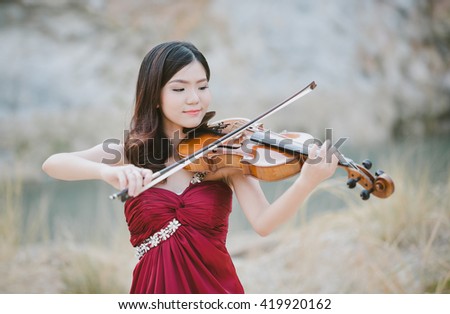  viola by a musician girl