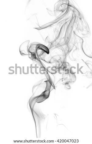 Abstract art. Grey smoke from the aromatic sticks on a white background. Background for Halloween. Texture fog. Design element. The concept of aromatherapy.