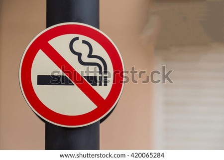 No smoking sign on public place background