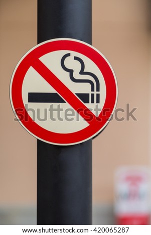 No smoking sign on public place background