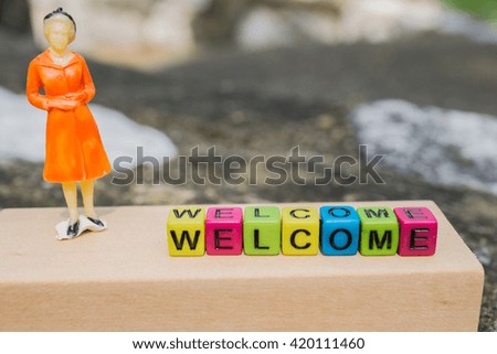 welcome (colorful cubes words series) with blurred background