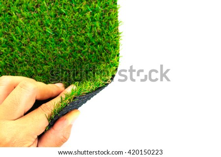 Hand open artificial grass with copy space for text on white background (selective focus) Royalty-Free Stock Photo #420150223