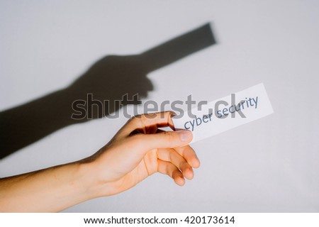 Hand holding cyber security sign