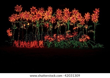 Lighted display of sunflowers during the holidays