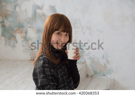 asian woman with cup
