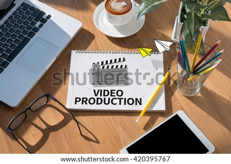 VIDEO PRODUCTION open book on table and coffee Business